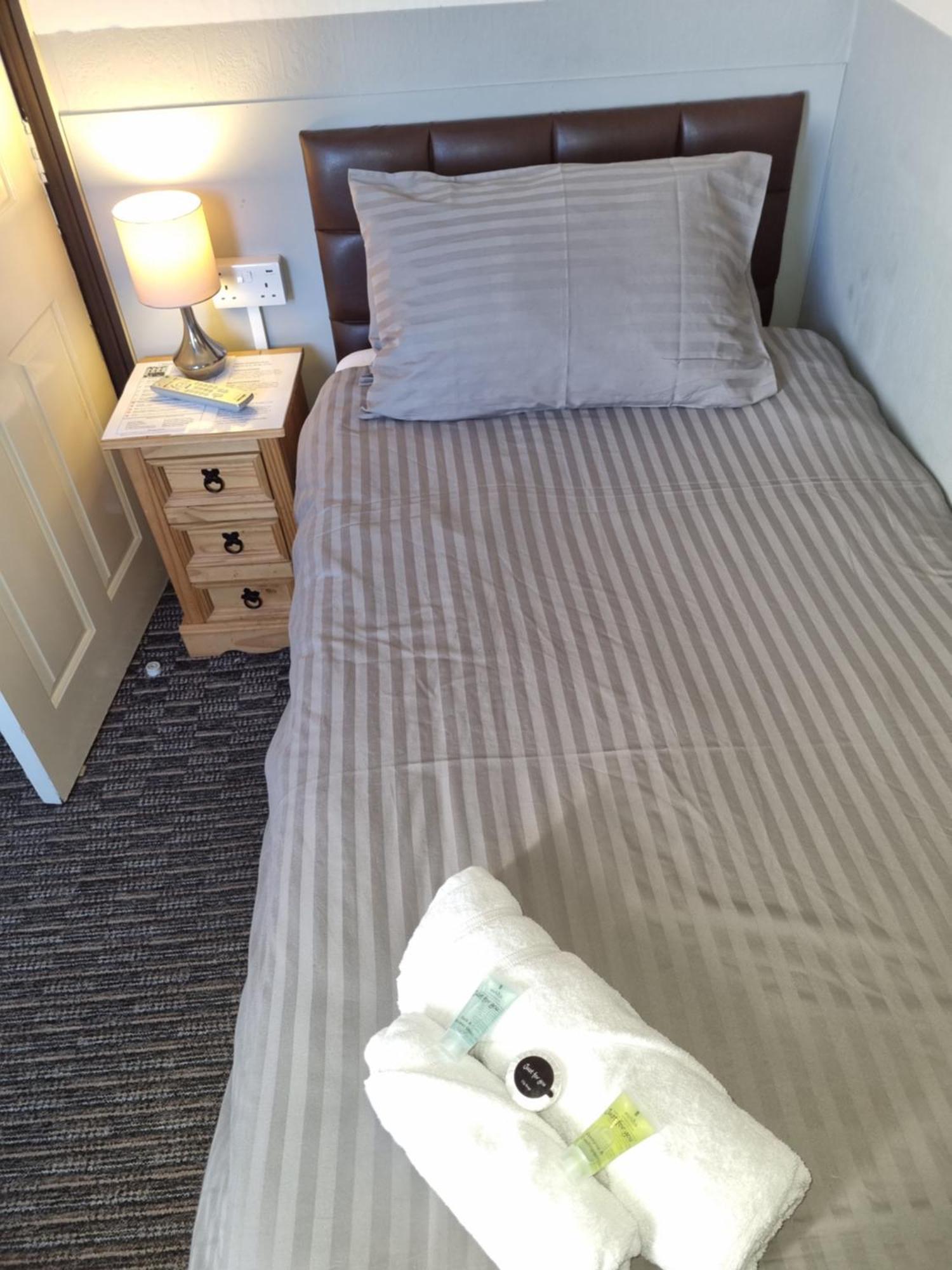 Single Room with Shared Shower and Toilet
