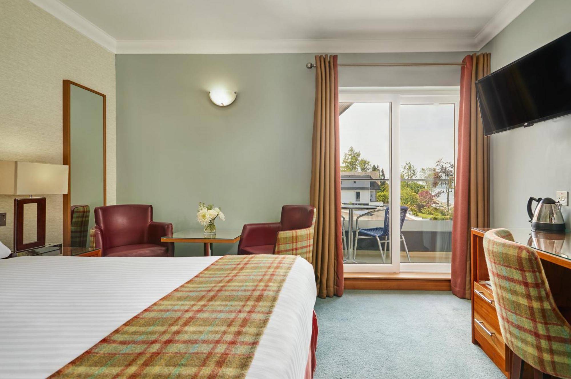 Queen Room with Balcony and Partial Loch view