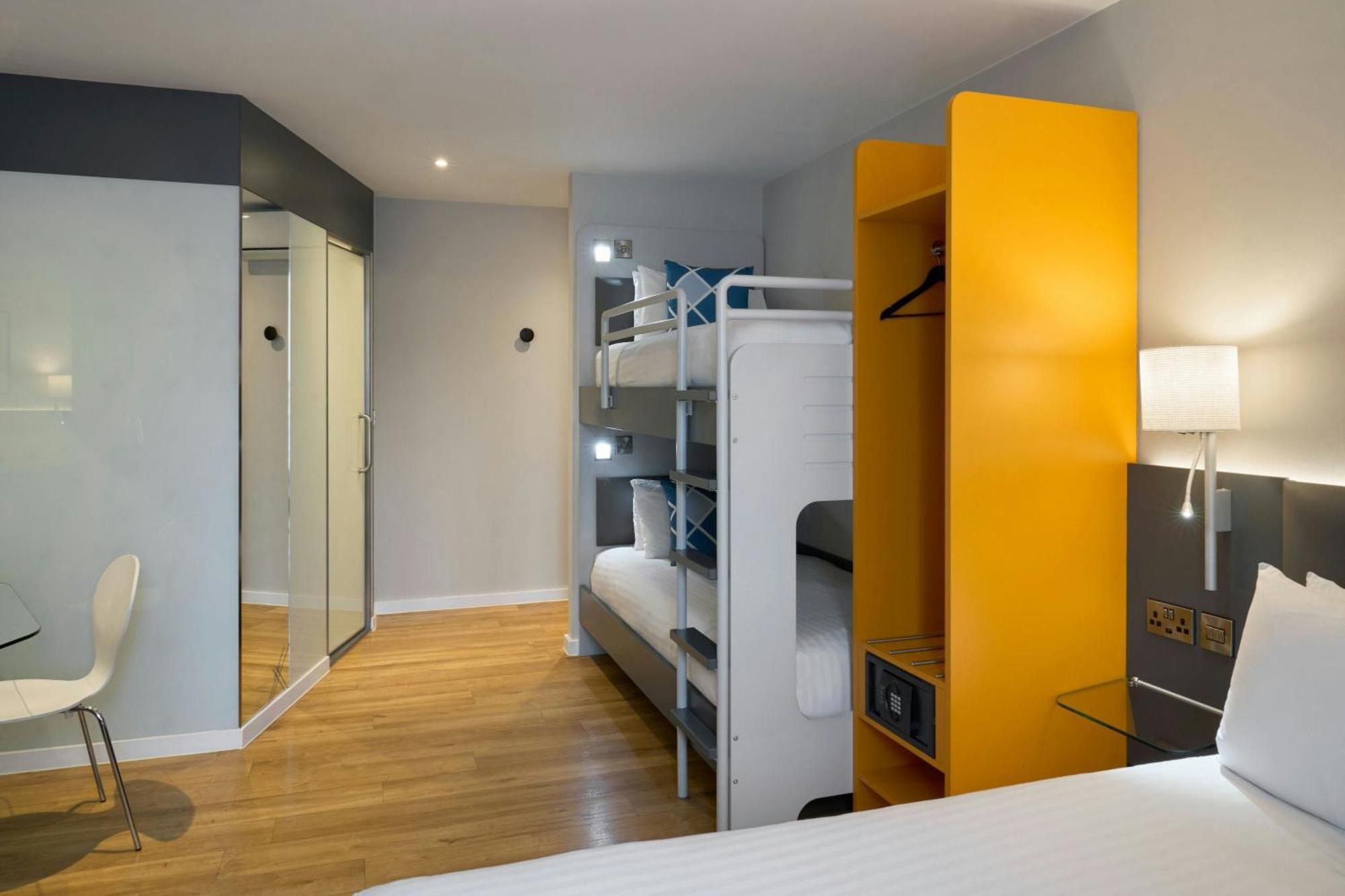 Family Room with One Double Bed and Two Bunk Beds