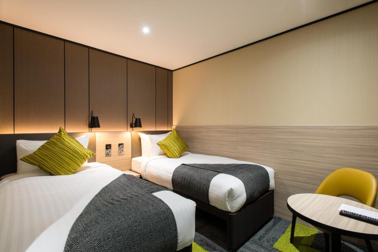 Quarto com 2 Camas de Solteiro